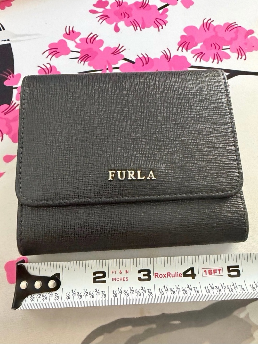 Furla black trifold wallet